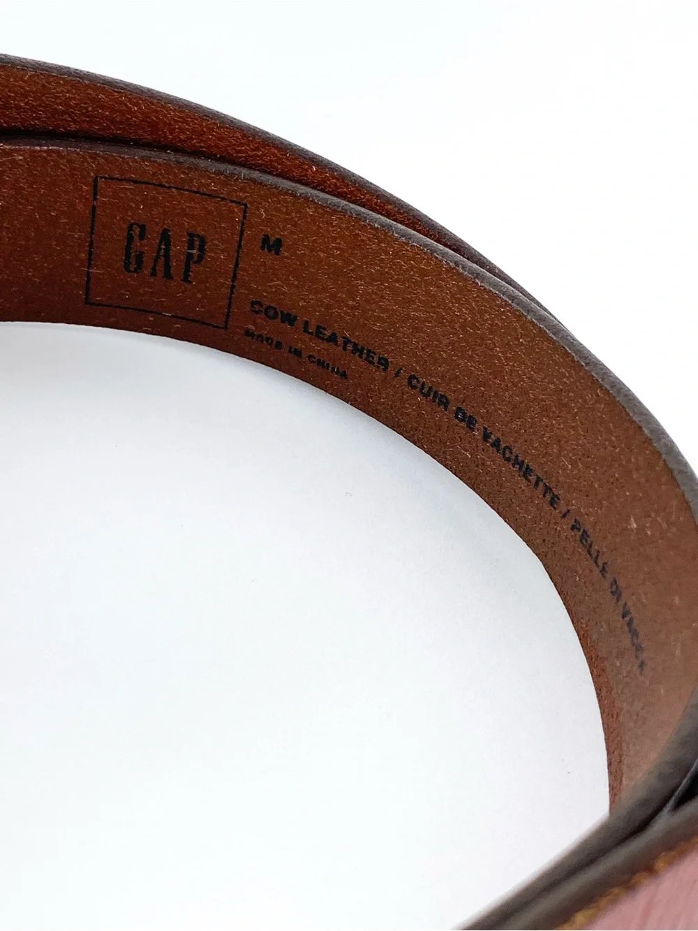 Gap leather belt in cognac red-brown color with brass tone buckle, medium